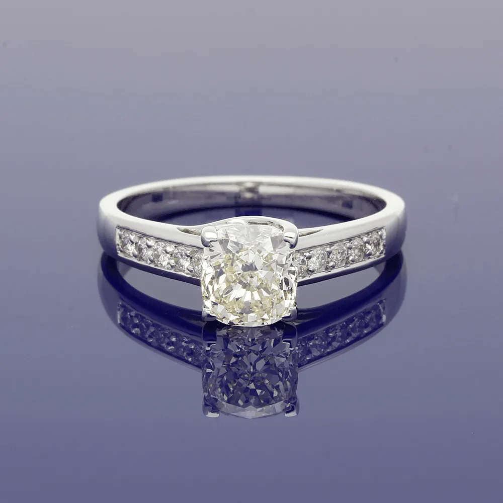 18ct White Gold Natural Yellow Diamond Solitaire with Diamond Set Shoulders